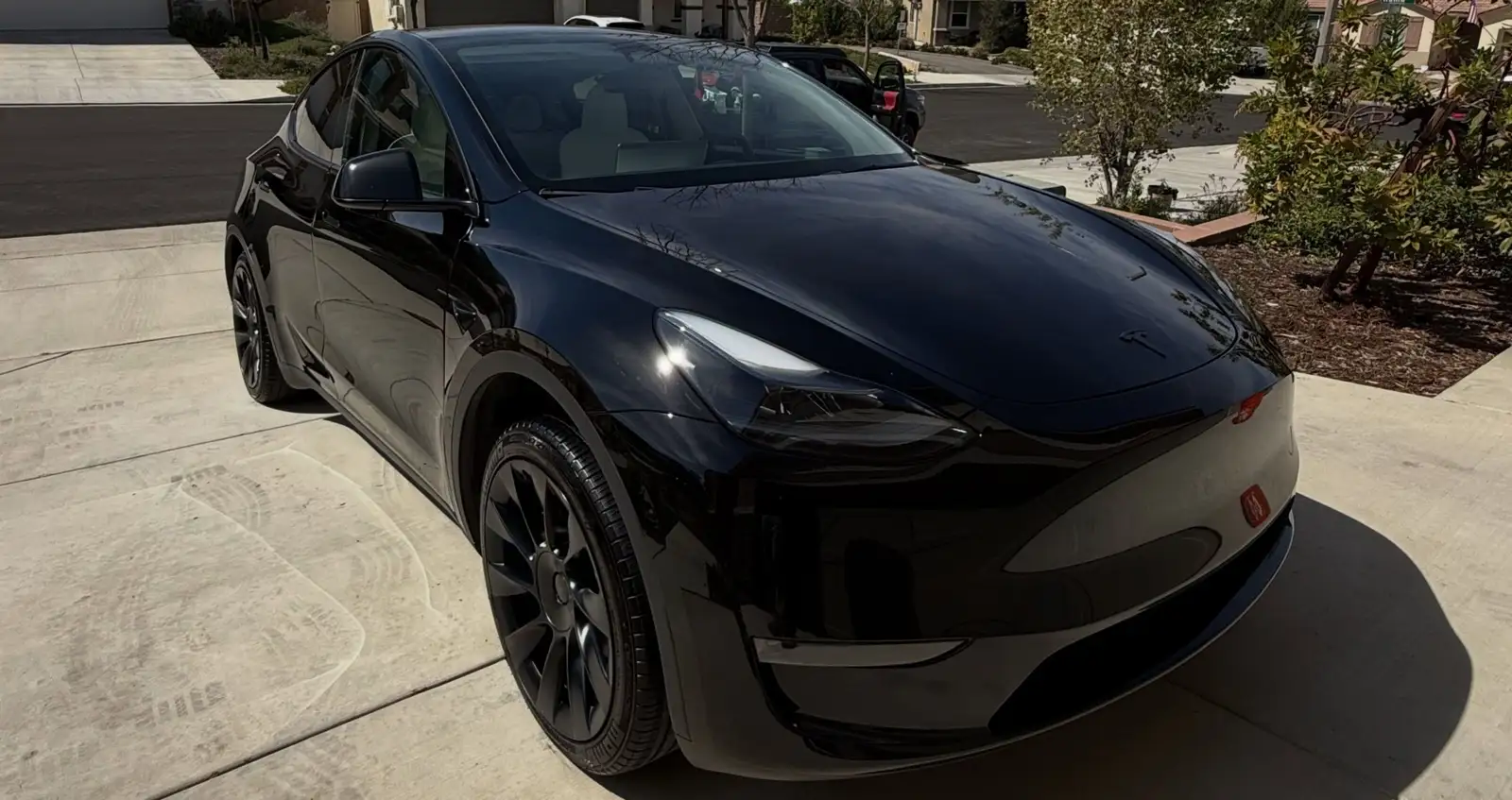 The black Tesla after the detail, clean and sealed