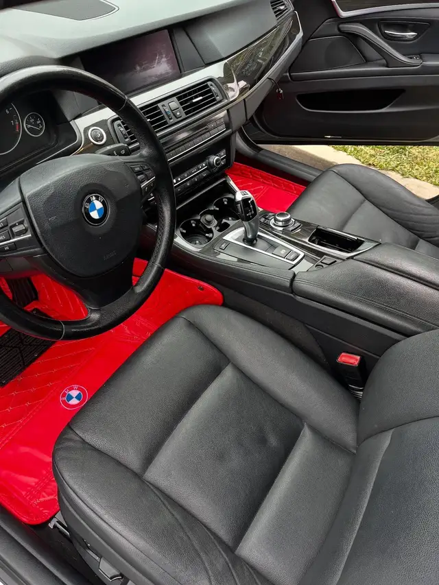 BMW cockpit and leather seats after an interior detail